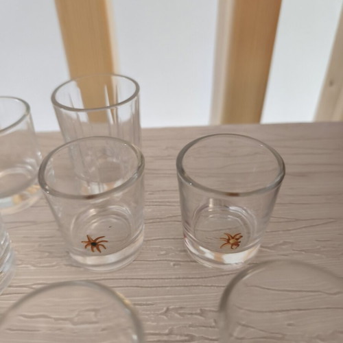 Shot glasses set of 8 with different designs like new