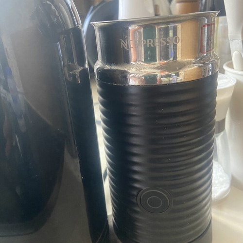 Nespresso DeLonghi espresso coffee machine with milk frother