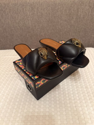 Kurt Geiger black leather sandals with gold emblem, size 40