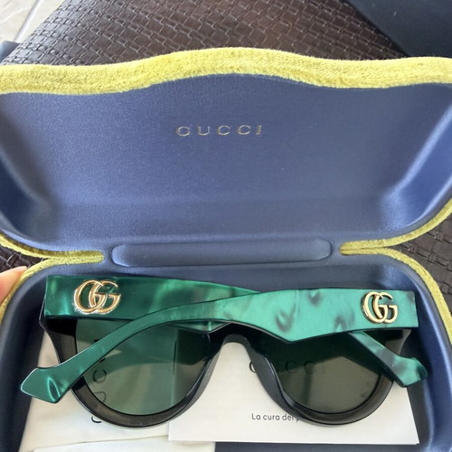 Gucci sunglasses used, black and green