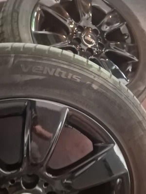 Mini 225 55 17 tires and rims like new, genuine black wheels