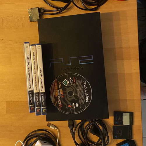 Sony PlayStation 2 console like new with 2 controllers, 2 memory cards, HDMI adapter, 4 games