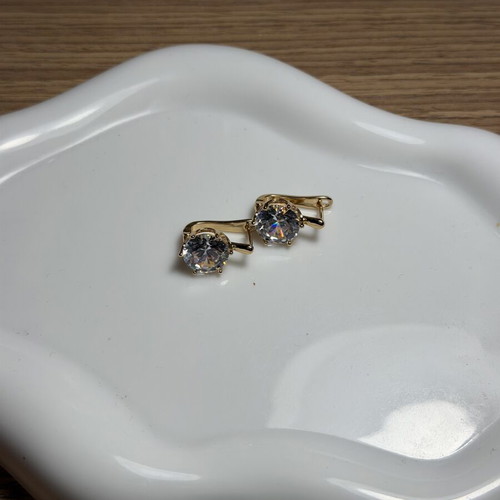 Earrings made of stainless steel, new, gold color