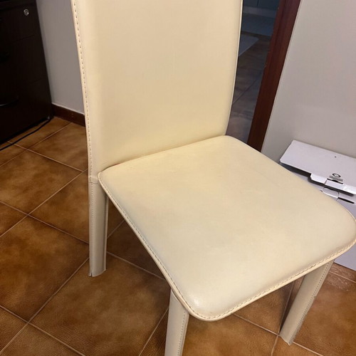 Chairs set of four used, ecru leatherette