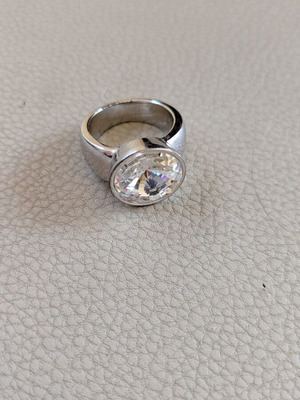 Silver ring used, steel with white sparkling stone