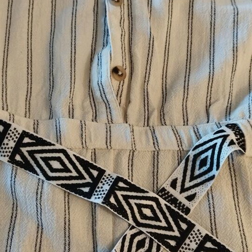 Girls' short jumpsuit like new, beige and white