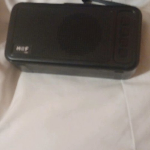 Wireless speaker used with flashlight and solar charging