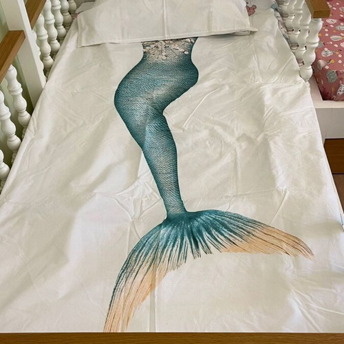 Snurk 2-in-1 duvet cover and blanket with mermaid design, organic cotton