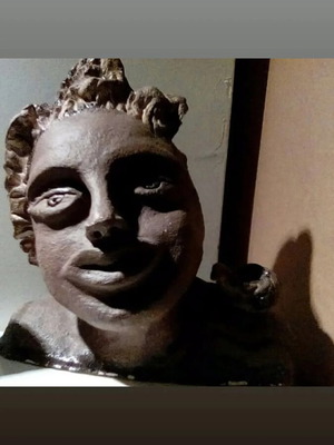 Ceramic sculpture new, double fired at 1300 degrees with African features