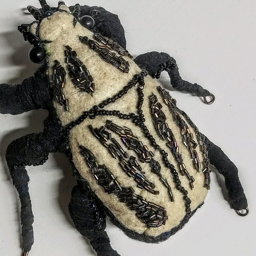 Art object Beetle new fabric with beads