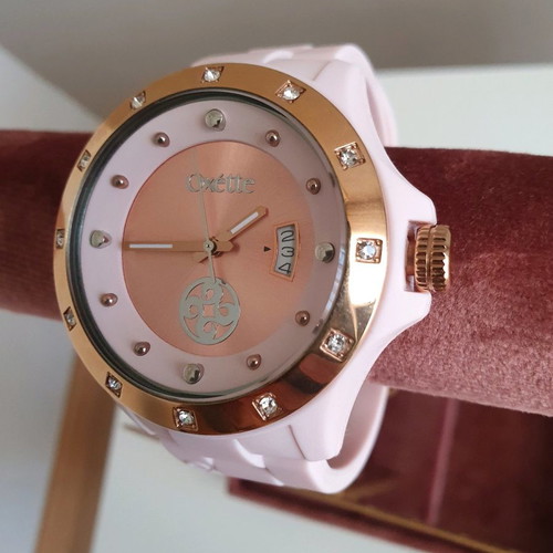 Oxette pink women's watch with rubber strap and pink gold dial like new