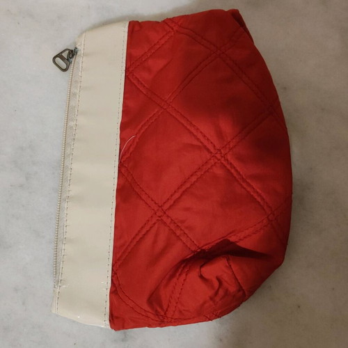 Toiletry bag used red with white stripe