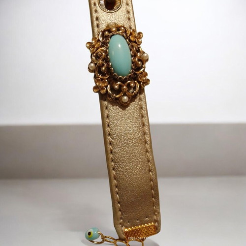 Handmade bracelet gold leatherette with blue stone centerpiece