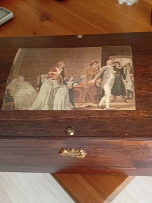 Vintage or antique wooden storage box with historic painting print