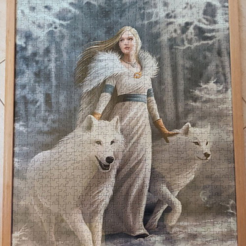 Framed puzzle like new, dimensions 0.53x0.73 m