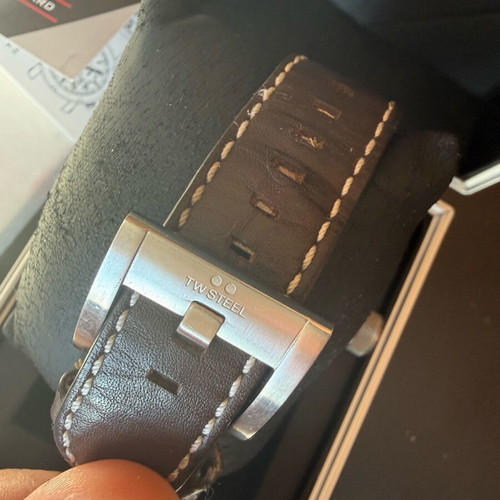 TW Steel watch used with brown strap and date display