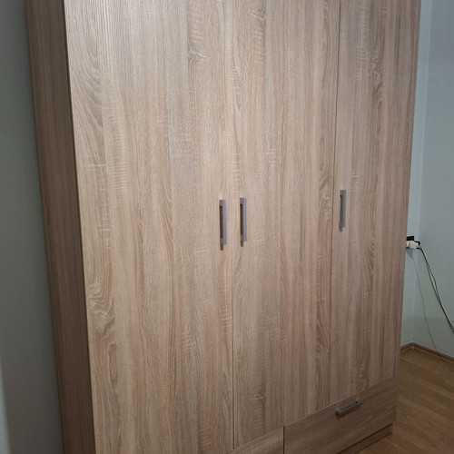 Three-door wardrobe with 2 drawers and shelves