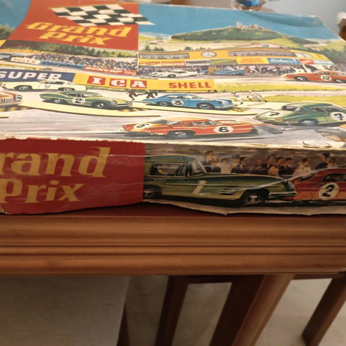 Race track toy with 3 wind-up cars used, 1960, metal