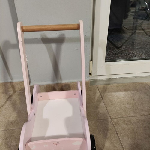 Wooden baby walker with 31 puzzle pieces