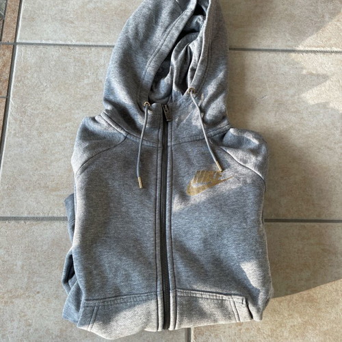 Nike jacket used gray with gold details and small defects