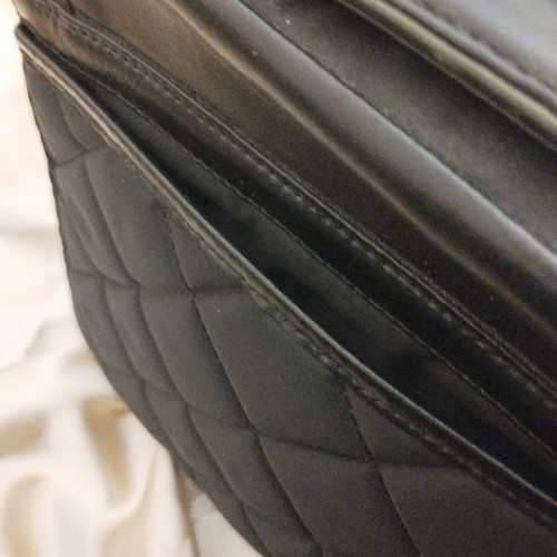 Knomo tablet sleeve bag used, leather and quilted fabric