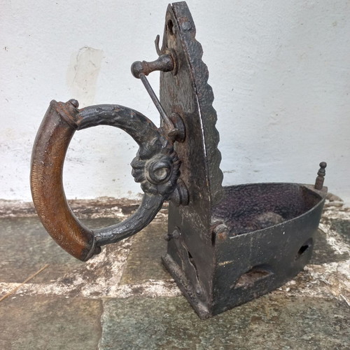 Karavaki Charcoal Iron used with ornate handle design