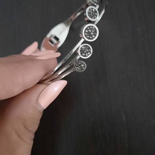 Rigide Stainless Steel bracelet like new with black and grey zirconia circles