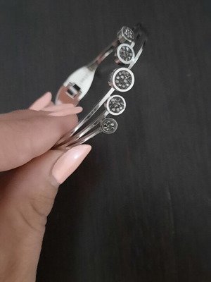 Rigide Stainless Steel bracelet like new with black and grey zirconia circles
