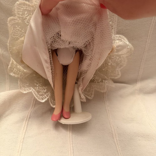 Porcelain doll vintage used, girl on stand