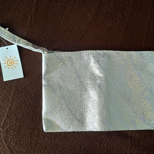 Waterproof toiletry bag, new with tags, white and silver