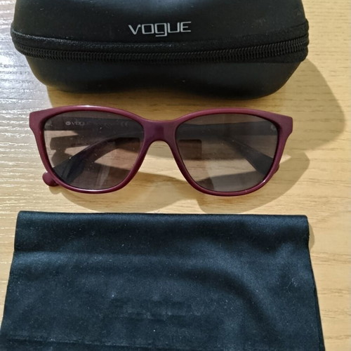 Vogue sunglasses used, engraved lenses, good frame