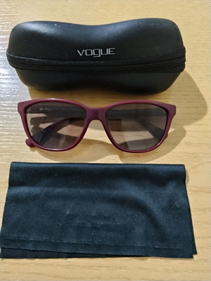 Vogue sunglasses used, engraved lenses, good frame