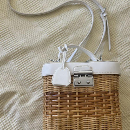 Wicker bag with white vegan leather crossbody strap like new