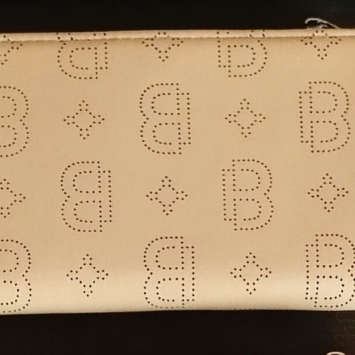 A To Z Greek wallet with multiple compartments, beige yellow