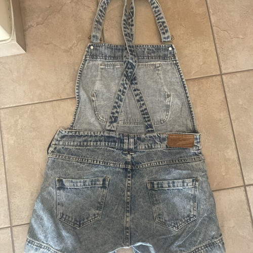 Pink Woman denim salopette used with zipper and pockets
