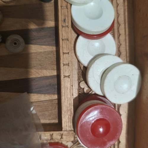 Carved backgammon/chess used with wooden Aztec-style pieces