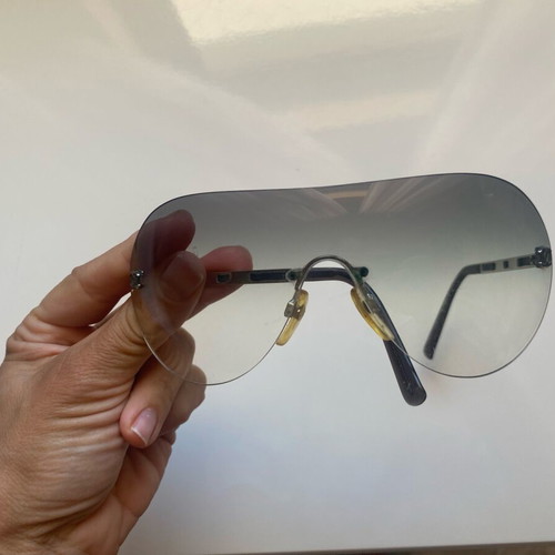 Chanel rimless sunglasses used with scratches on lenses