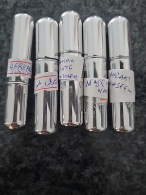 Decant Arabic perfumes pack of 5, like new, genuine transferred fragrance