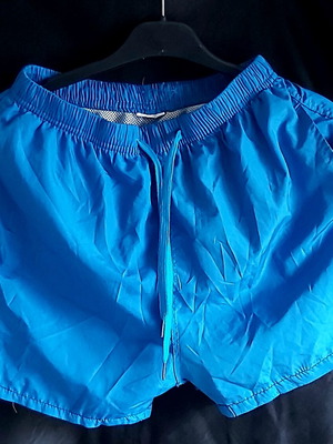 Children's swim shorts like new, size 6-8, blue