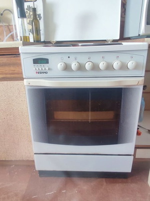 Eskimo electric stove used with electronic timer and illuminated switches