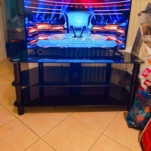 Black glass coffee table for TV