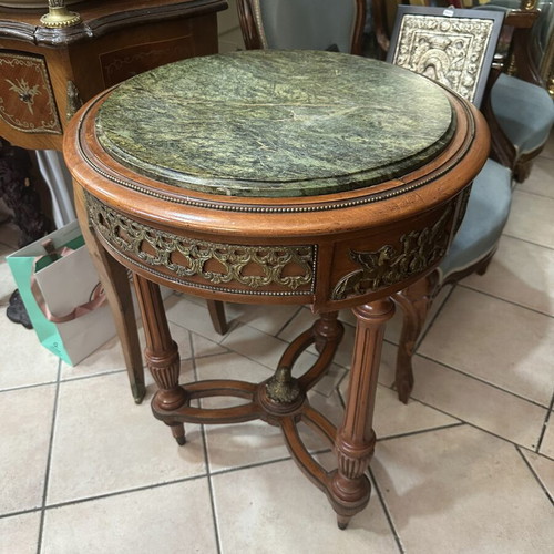 Table with bronze details and marble top used