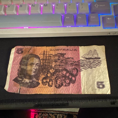 Australia 1974 5 dollar note used with taped tear