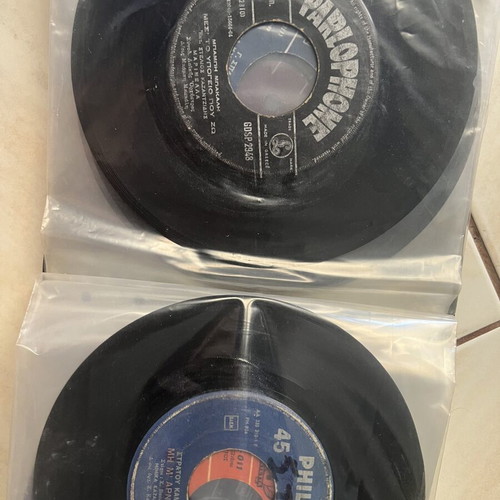 Vinyl 45 rpm records used, two cases with over fifty laiko and rembetika