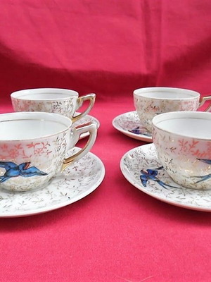 Porcelain cups with blue birds and gold designs, set of 4