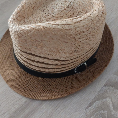 Straw hat like new with black strap, one size
