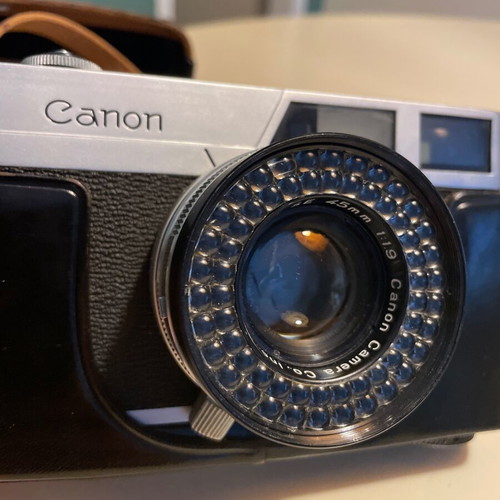 Canon Canonet vintage camera with 45mm f/1.9 lens and leather case like new