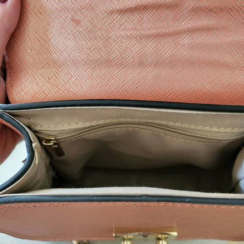 Shoulder bag new in pink-gold color with gold strap