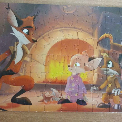 Puzzle used 60 pieces with Renart the Fox theme