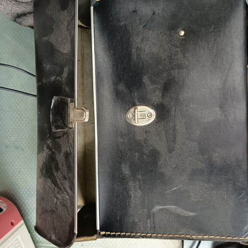 Polaroid 210 camera used with carrying case and manuals